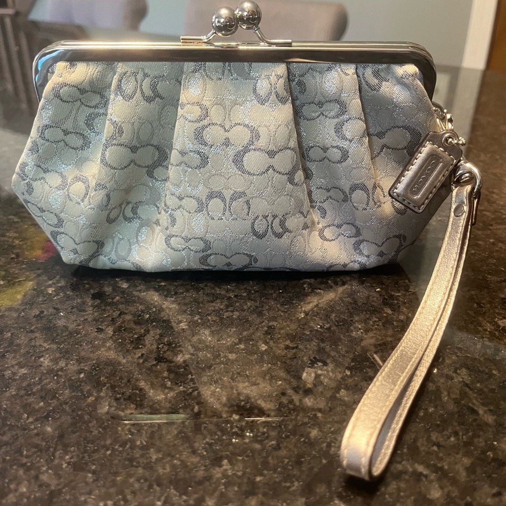NWOT Coach silver wristlet.